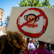 People hold signs during a rally to demand that the federal government respond quickly to the recent San Francisco monkeypox outbreak at the San Francisco Federal Building on July 18, 2022 in San Francisco, California. The rally, held to call for the Centers for Disease Control & Prevention and the U.S. Department of Health & Human Services to increase access to vaccines, ensure equity in vaccine and testing distribution and fight stigma against the LGBTQ+ community, was co-hosted by groups including the Alice B. Toklas LGBTQ Democratic Club, Harvey Milk LGBTQ Democratic Club and San Francisco AIDS Foundation.